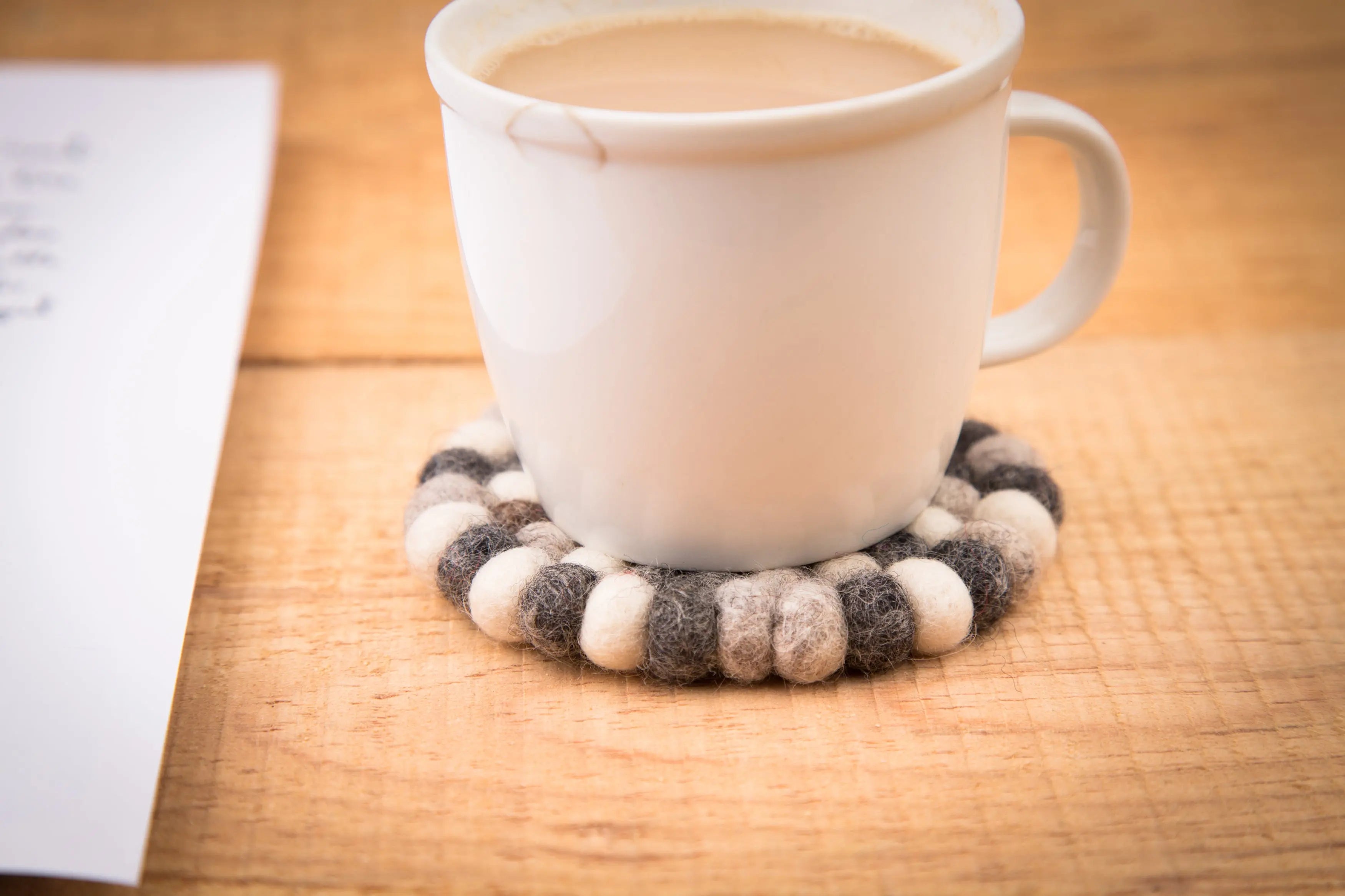 Embrace the Vibrant Beauty of Wholesale Felt Ball Trivets and Coasters from Nepal: A Reseller's Dream! - Best Himalaya