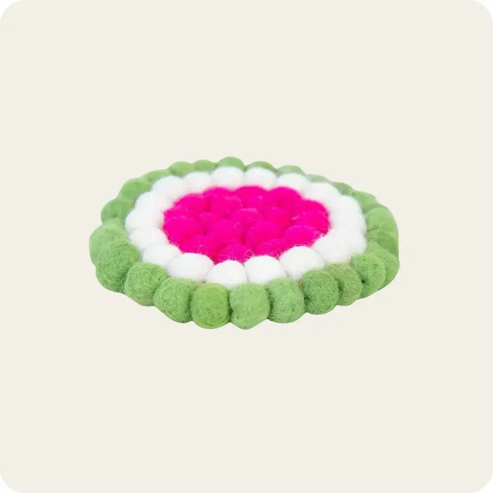 olorful felt ball coaster, handwoven, made from eco-friendly wool, perfect for protecting surfaces and adding a touch of warmth to home decor.