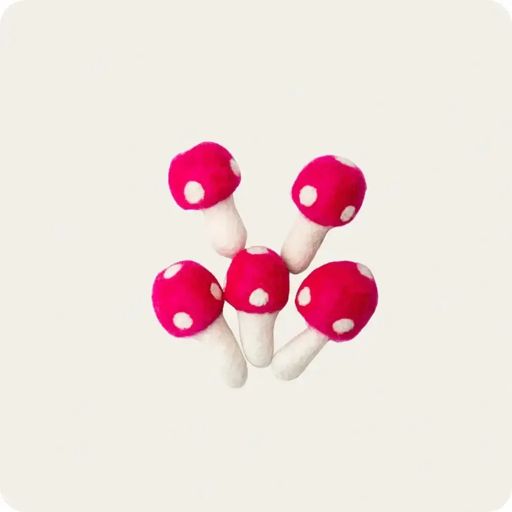 Felt Mushrooms for Garlands" – Bright red felt mushrooms with white spots, perfect for creating playful, decorative garlands.