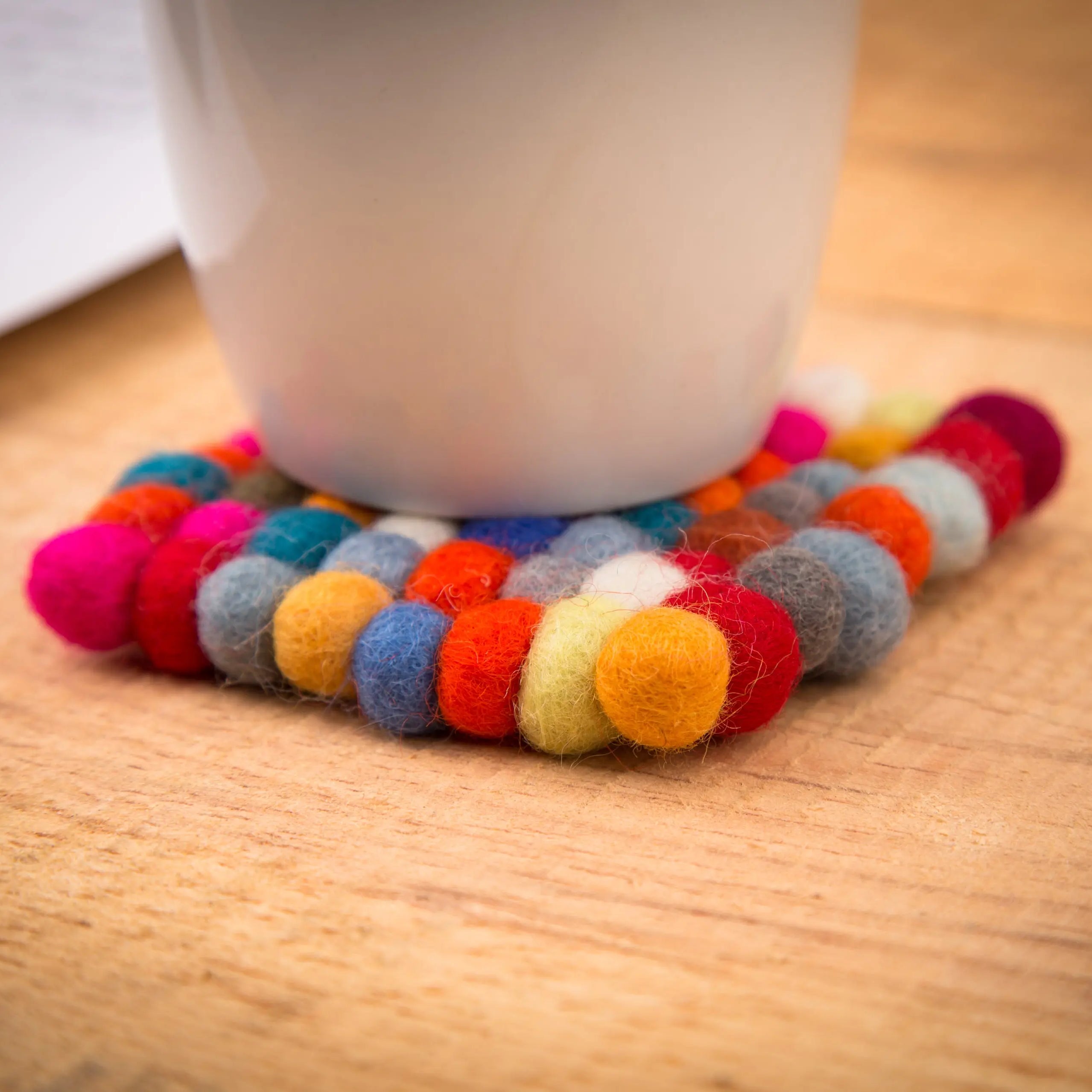 Elevate Your Table Decor with Handcrafted Wool Felt Ball Mats from Nepal – The Perfect Tea Coasters Best Himalaya