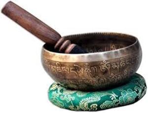 Playing-Singing-Bowl-with-a-Mallet-Striker-and-Cushion-A-Harmonious-Guide Best Himalaya