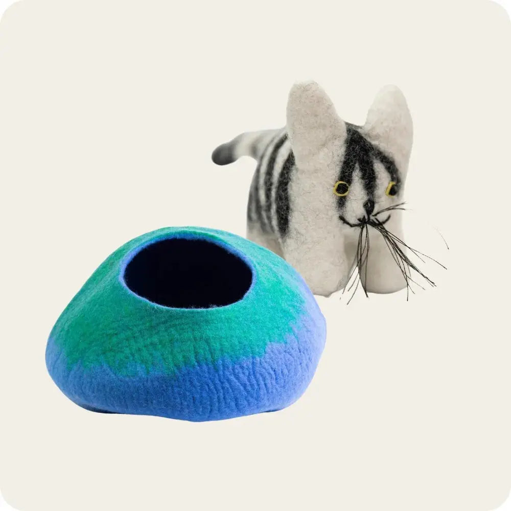 Cozy felt cat cave and felt toy, sustainable and stylish pet accessories.