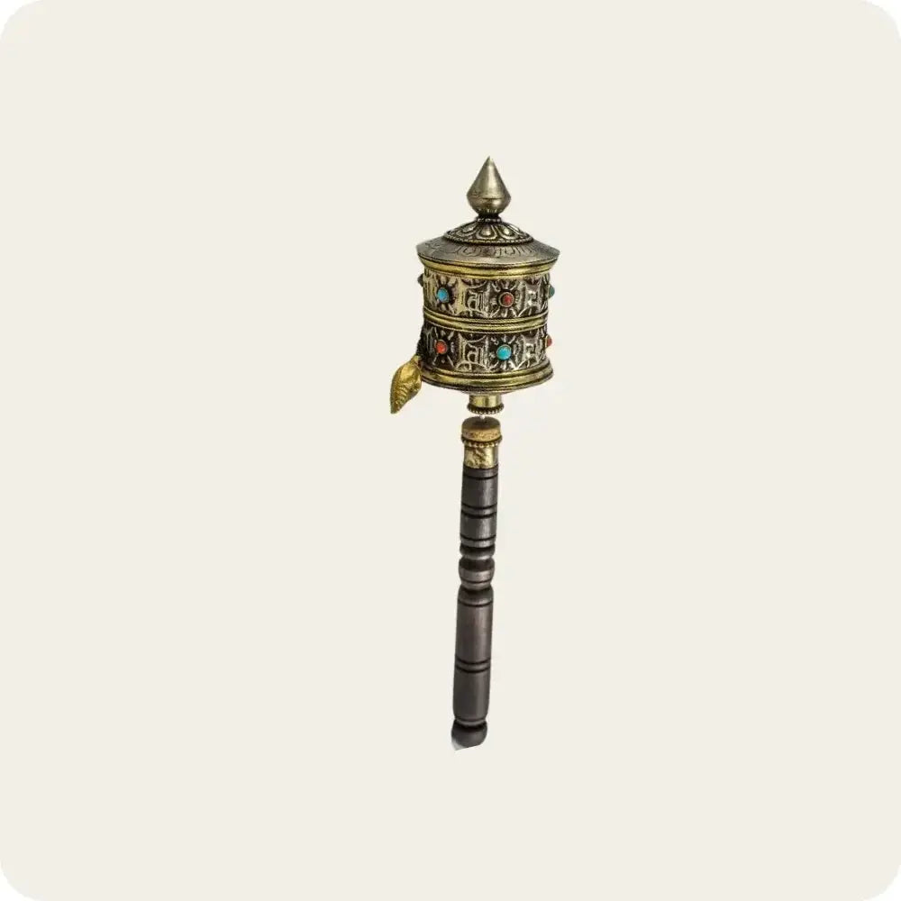 Handcrafted Tibetan Buddhist prayer wheel with intricate carvings and embellishments, perfect for meditation and spiritual practice.