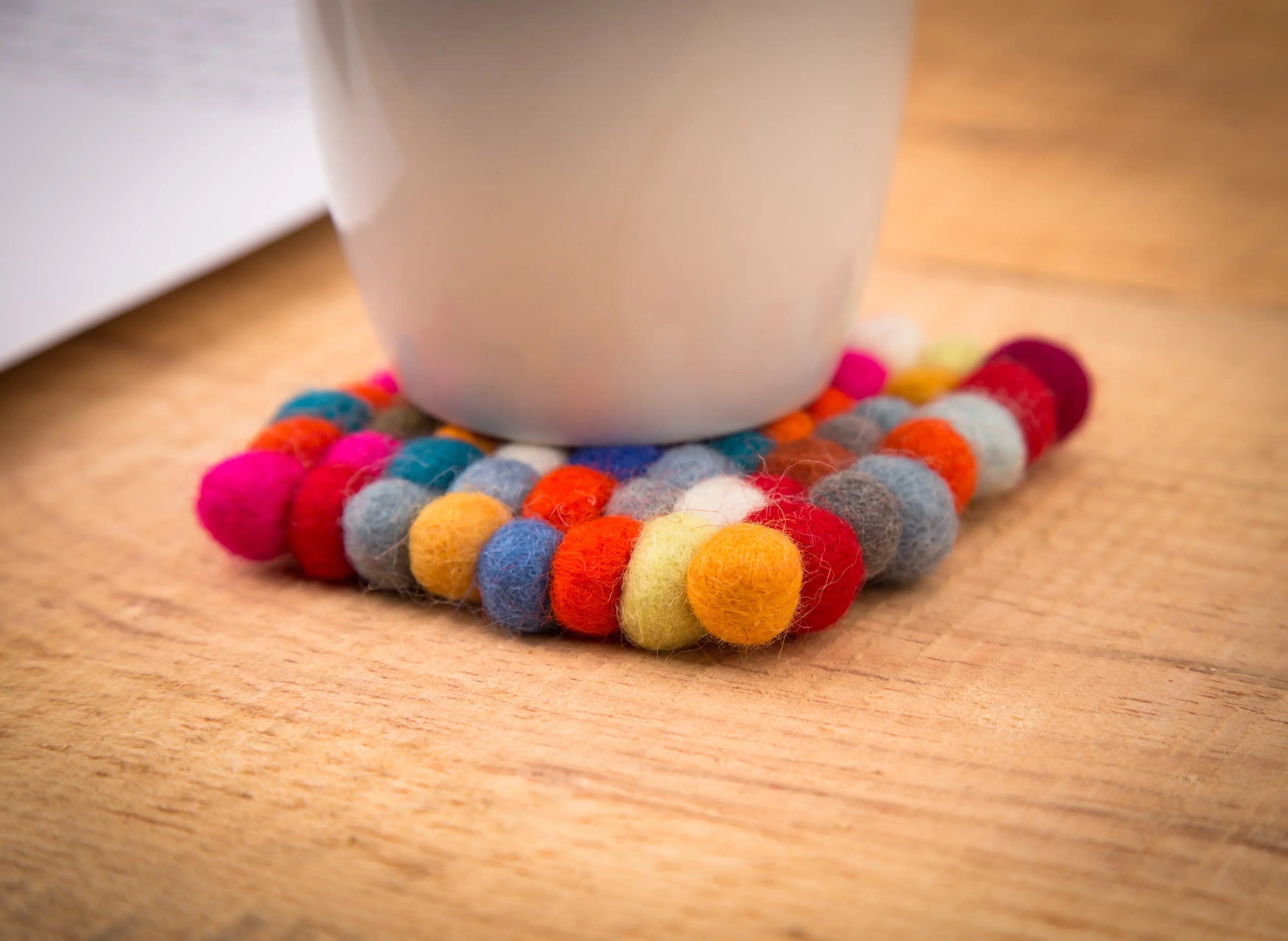 Elevate Your Table Decor with Handcrafted Wool Felt Ball Mats from Nepal – The Perfect Tea Coasters Best Himalaya