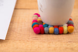 Elevate Your Table Decor with Handcrafted Wool Felt Ball Mats from Nepal – The Perfect Tea Coasters